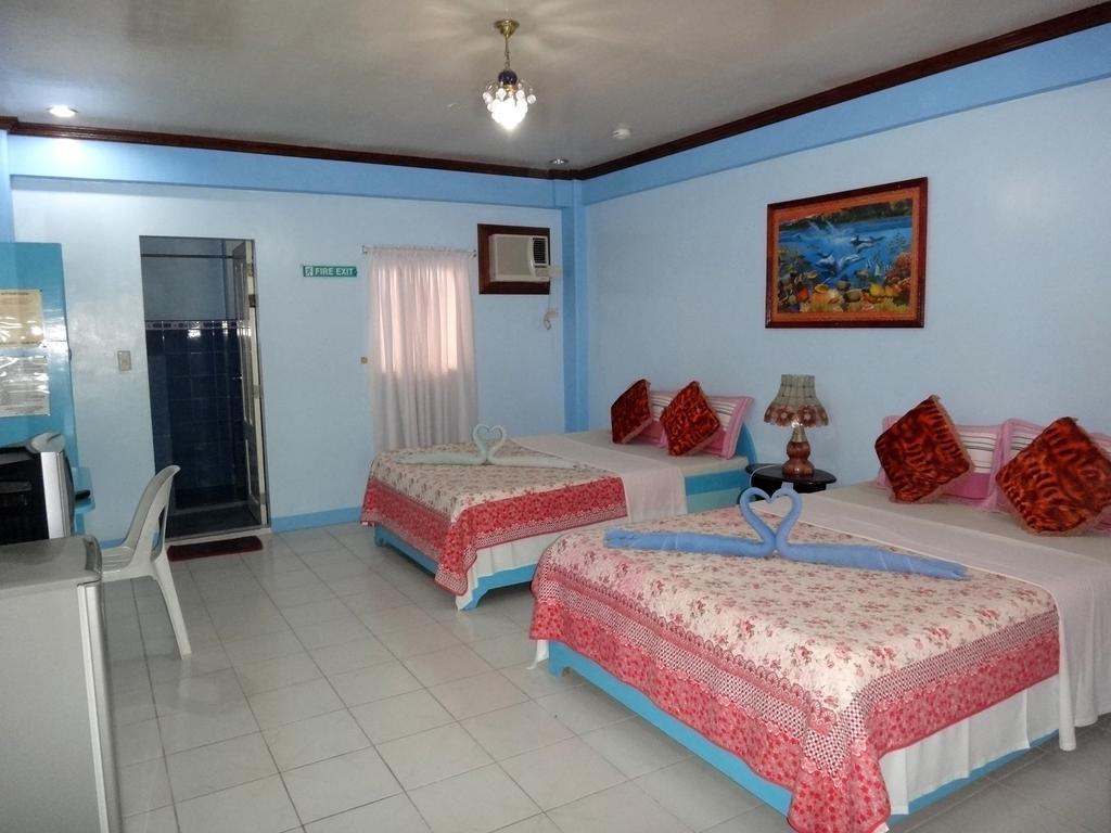 Starfire Resort Manoc-Manoc Quarto foto